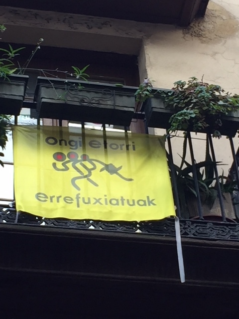 Basque language flag welcomes refugees 
